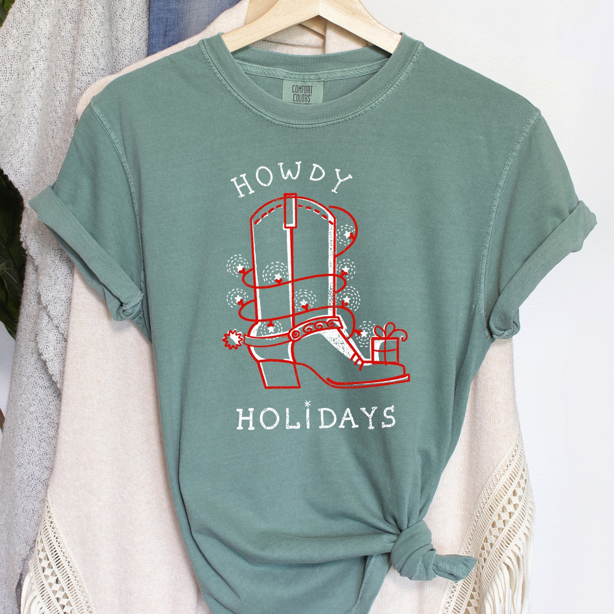 Howdy Holidays Christmas Cowboy Boot Retro Western Style Festive Vintage Comfort Colors Tee