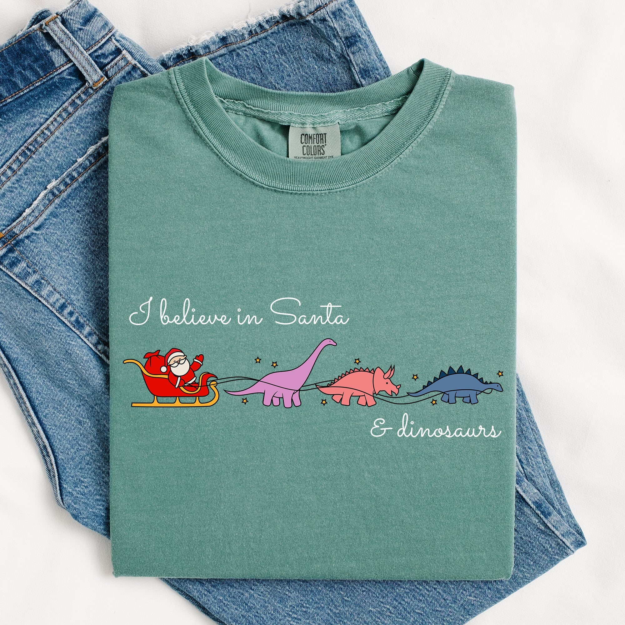 I Believe In Santa And Dinosaurs Sleigh Reindeer Christmas Winter Xmas Comfort Colors Tee