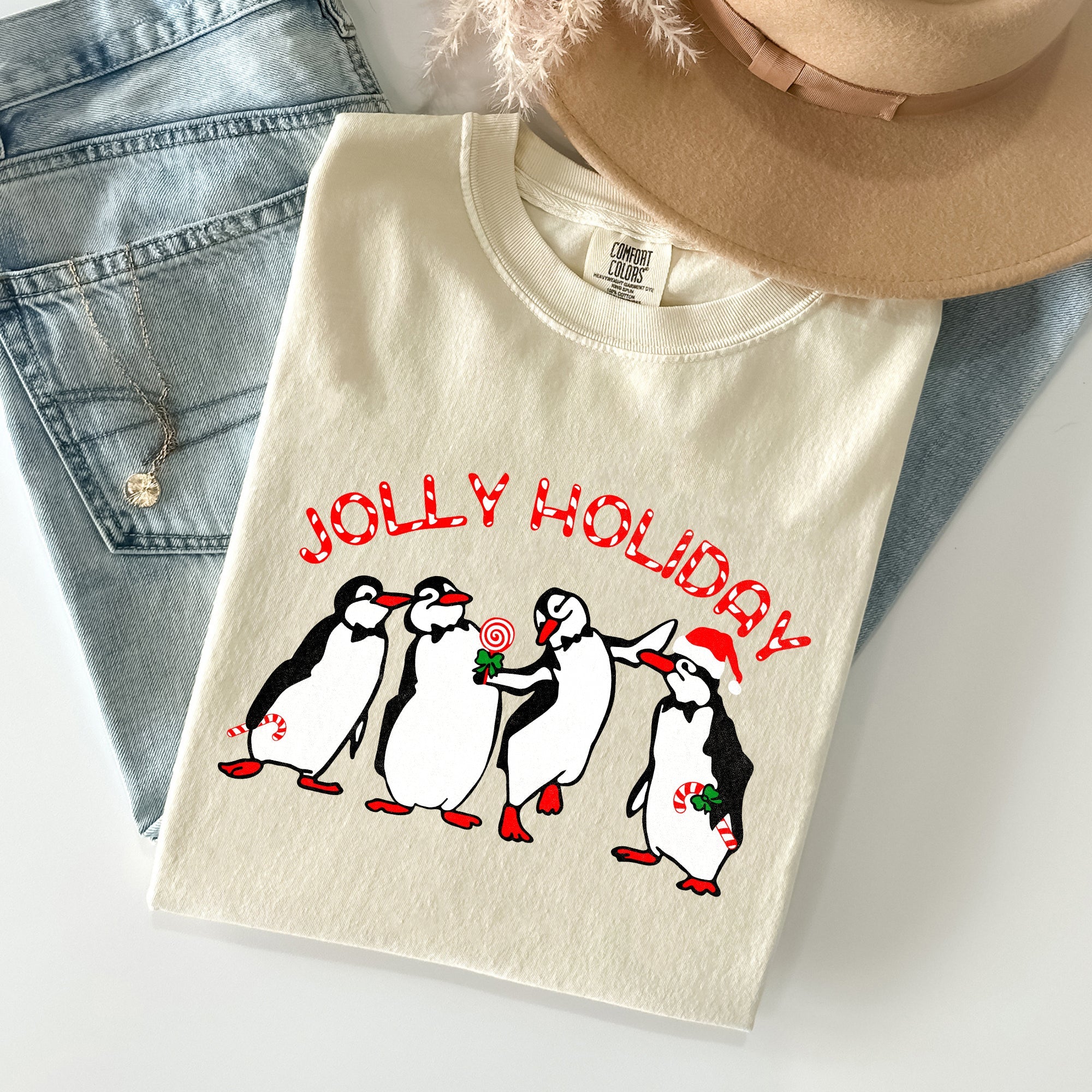 Jolly Holiday Penguins Christmas Winter Santa Claus Scene Vintage Graphic Comfort Colors Tee