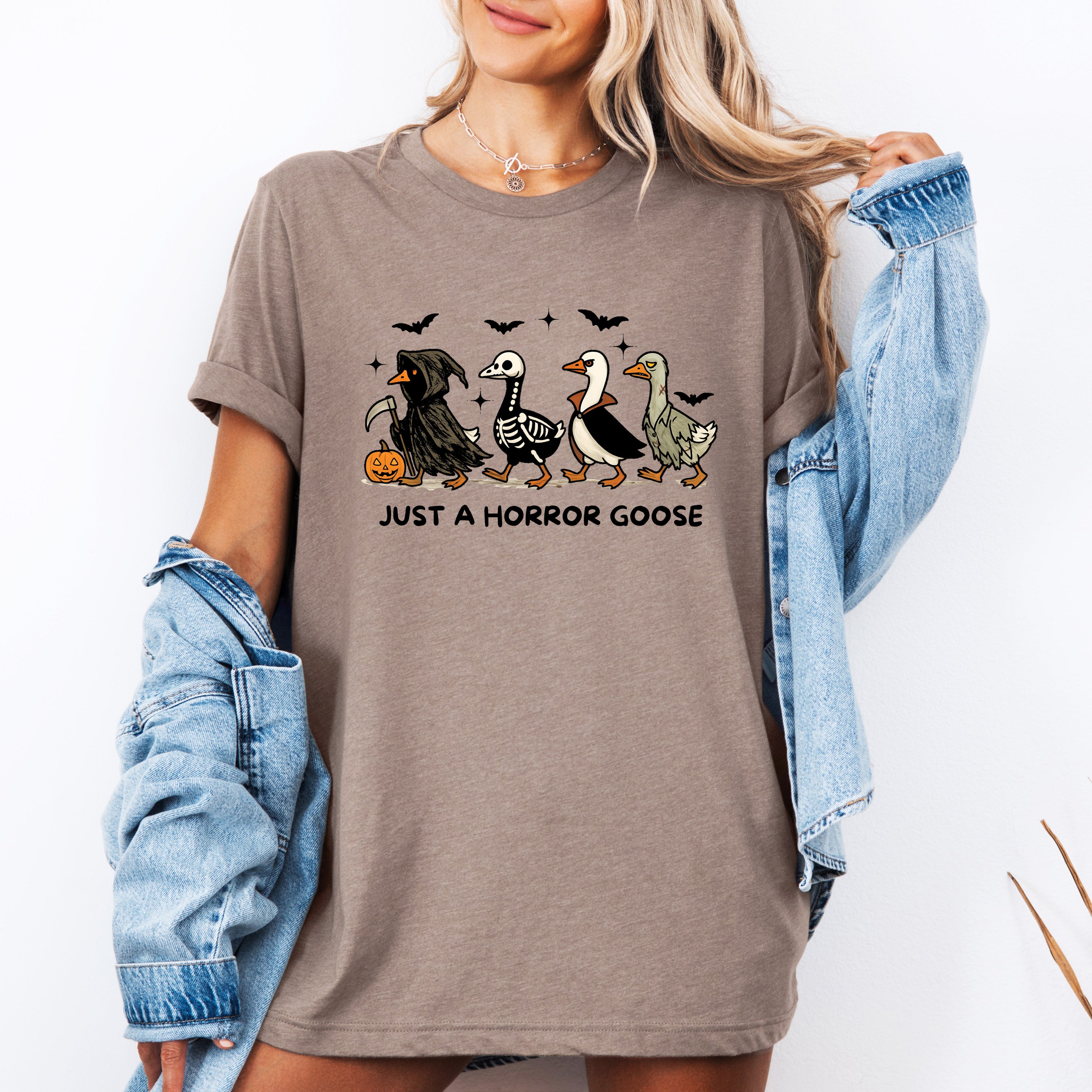 Just A Horror Goose Halloween Spooky Playful Creepy Quirky Festive Nighttime Chills Graphic Tee