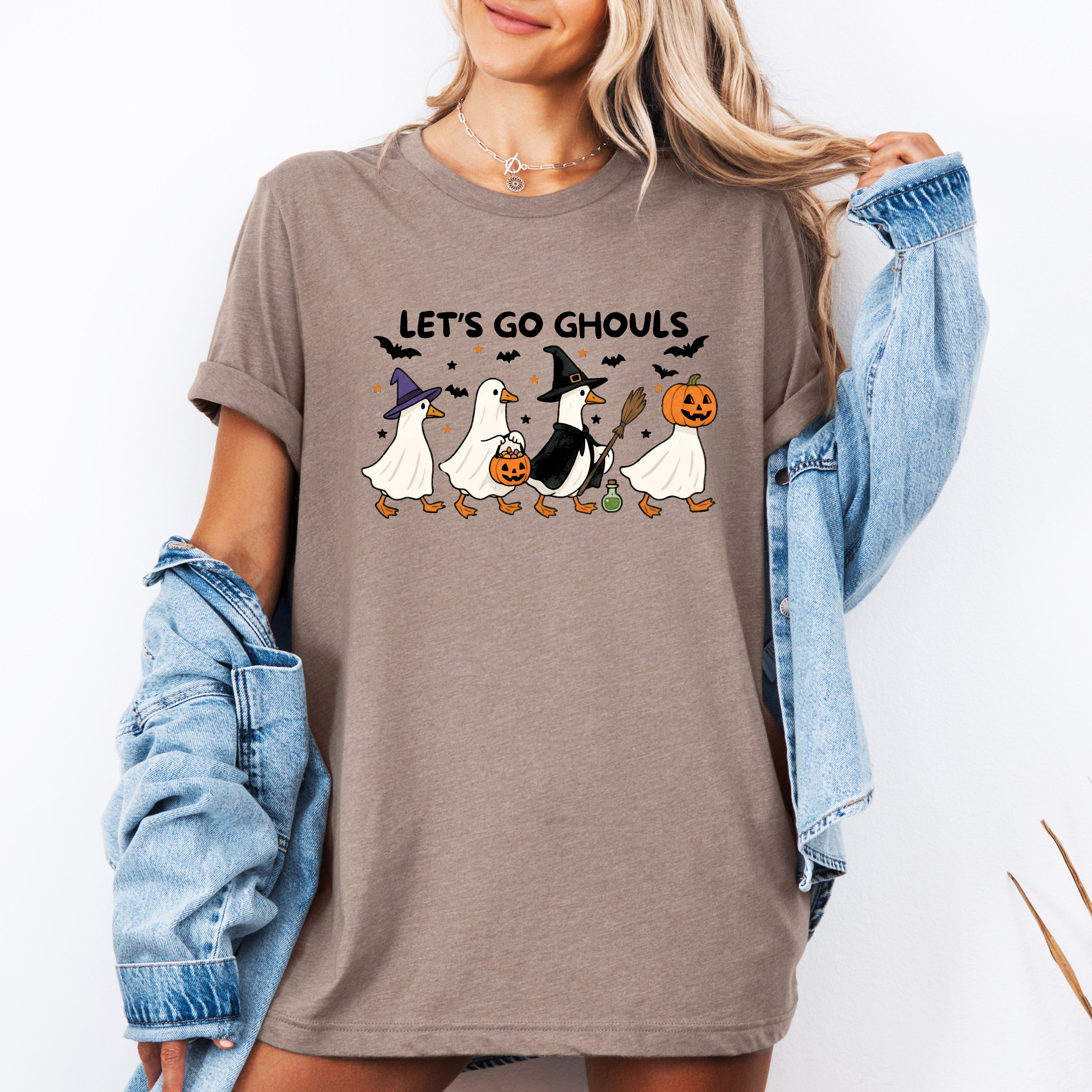 Let's Go Ghouls Geese With Witch Hats For Halloween Night Grinning Goose Parade Graphic Tee