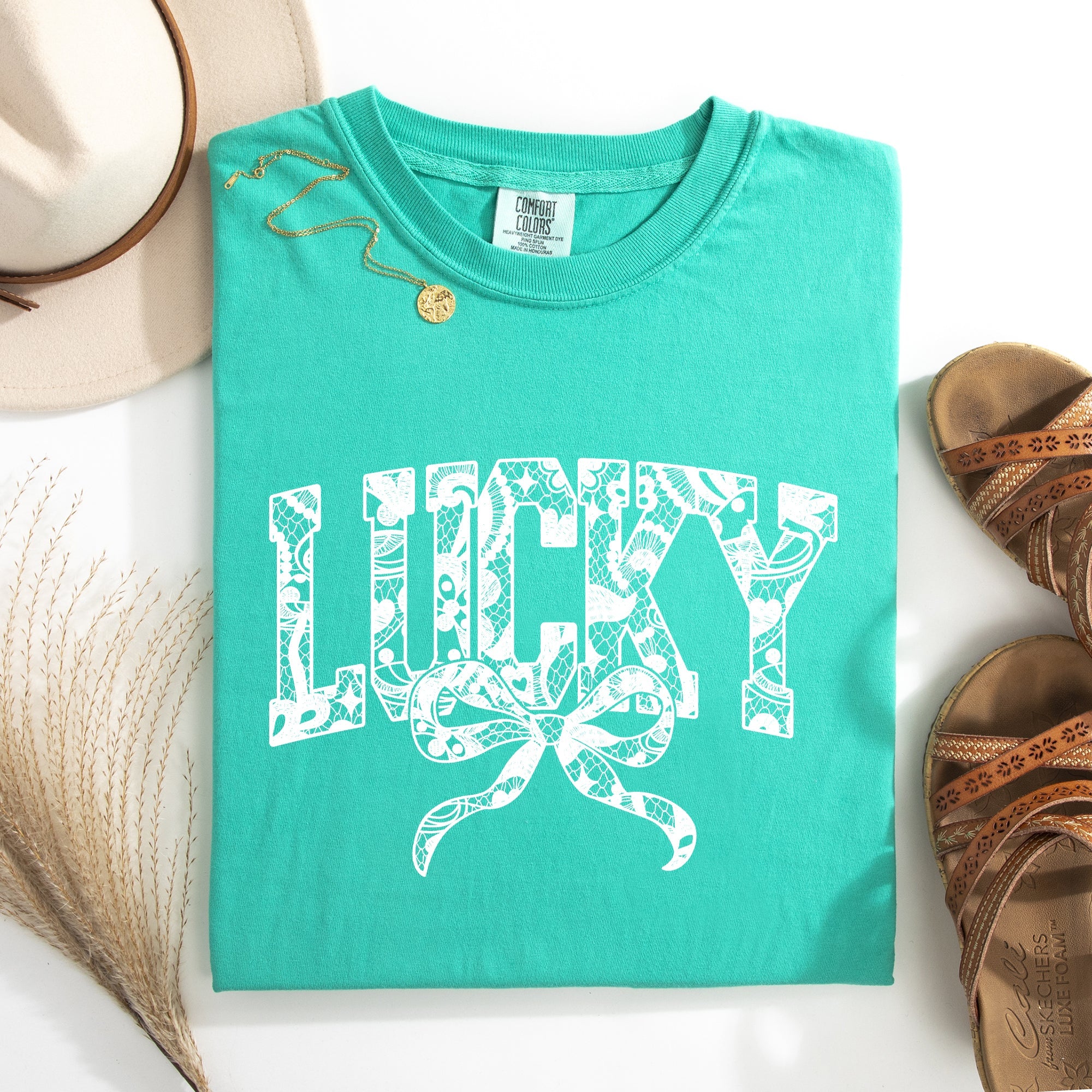 Lucky Lace Coquette Ribbon St Patrick's Day Shamrock Clover Leprechaun Comfort Colors Tee