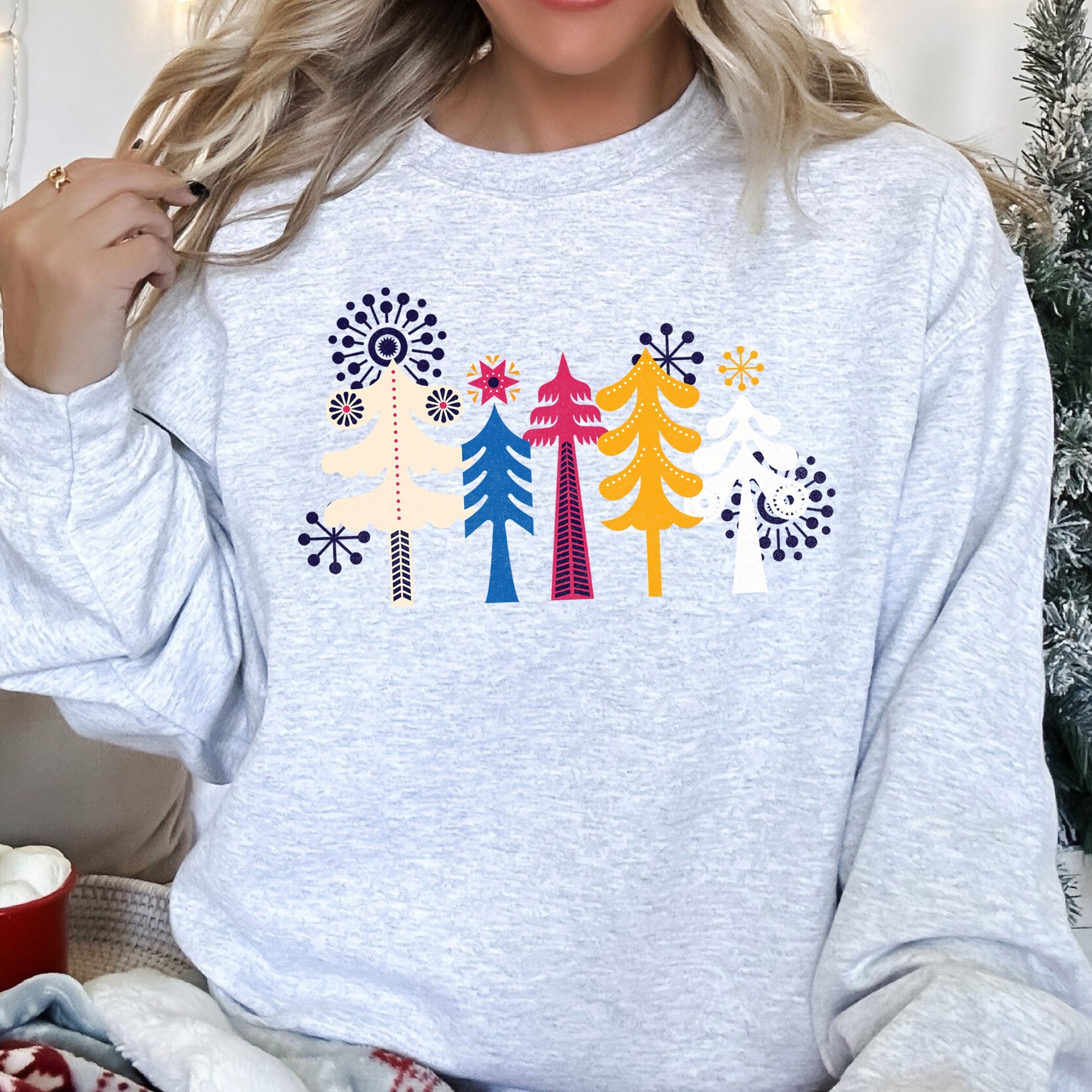 Noel Folk Art Christmas Ornament Moonlit Village Winter Night Scenic Design Inspiring Warmth and Joy Sweatshirt