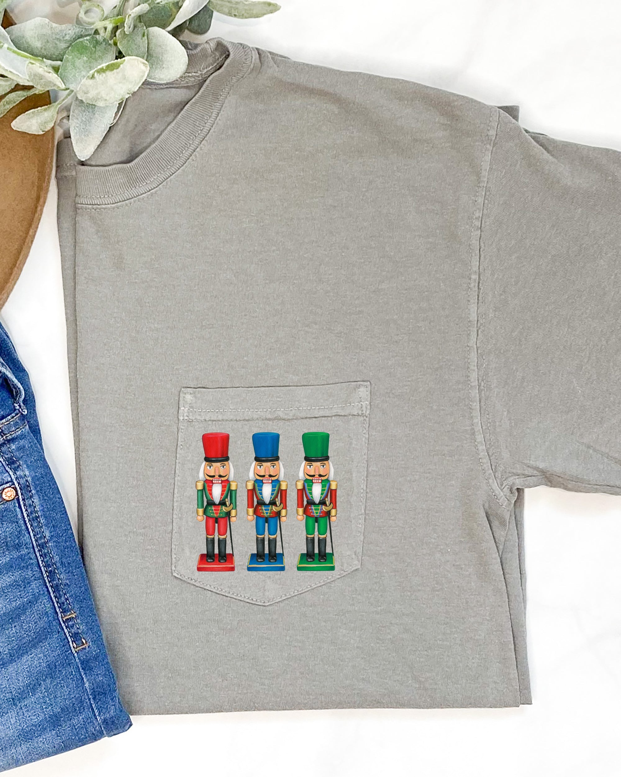 Nutcrackers Pocket Christmas Santa Snow Xmas Cozy Holiday Keepsakes Comfort Colors Tee