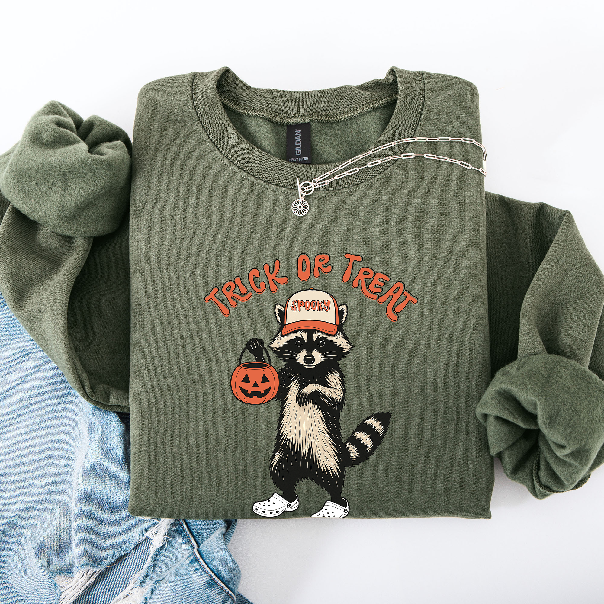Raccoon Trick Or Treat Halloween Spooky Cozy Nighttime Autumn Theme Seasonal Fun Sweatshirt