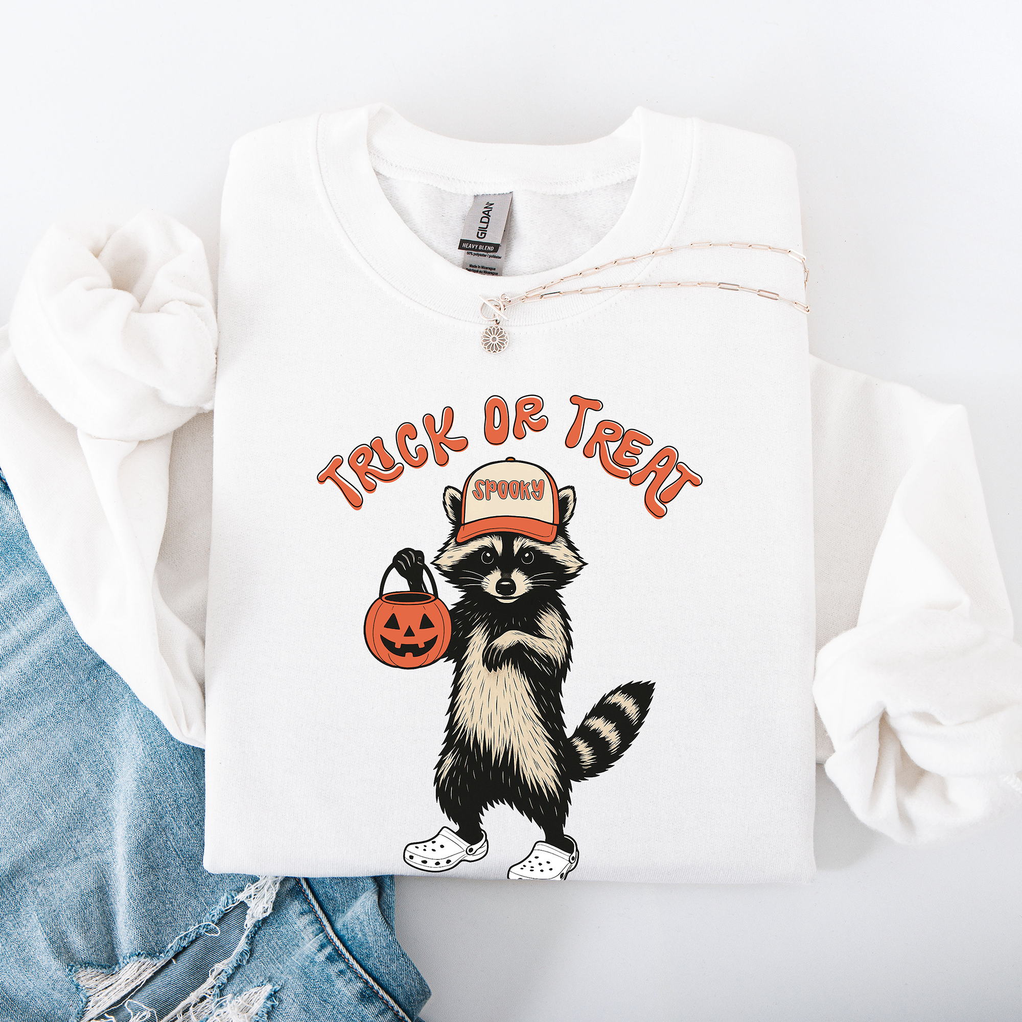 Raccoon Trick Or Treat Halloween Spooky Cozy Nighttime Autumn Theme Seasonal Fun Sweatshirt