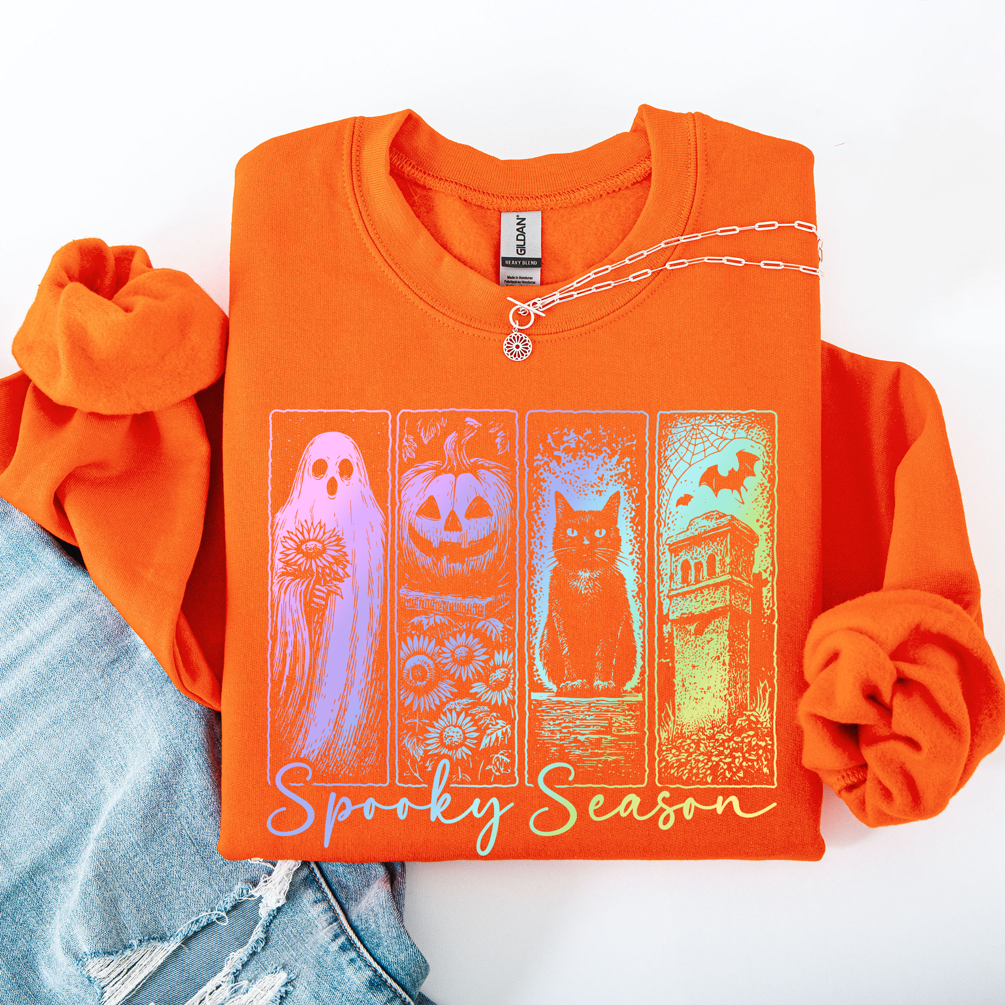 Spooky Season Graphic Sweatshirt With Retro Halloween Pastel Ghost Design And Faux Denim Accent