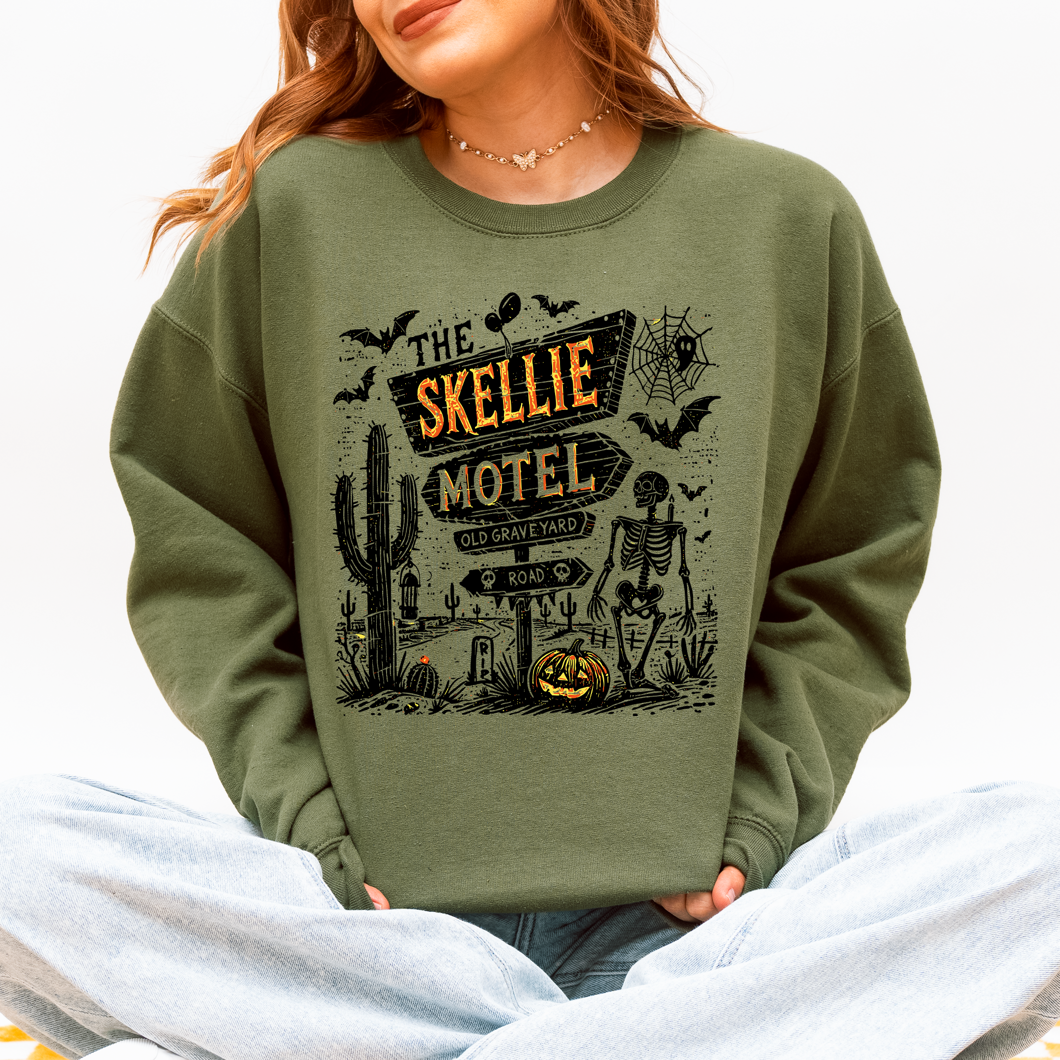 The Skellie Motel Skeleton Halloween Night Haunting Edition With Spooky Vibes And Retro Motel Aesthetic Sweatshirt