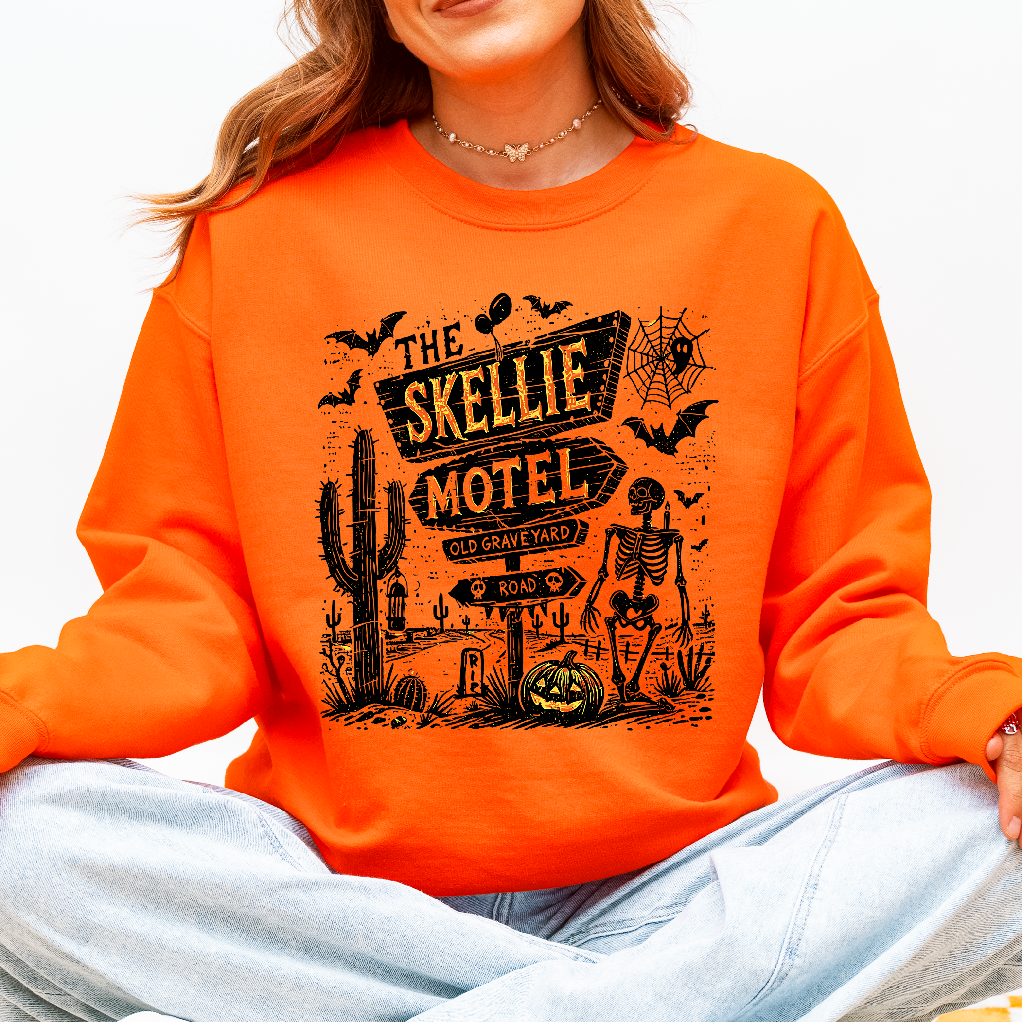 The Skellie Motel Skeleton Halloween Night Haunting Edition With Spooky Vibes And Retro Motel Aesthetic Sweatshirt