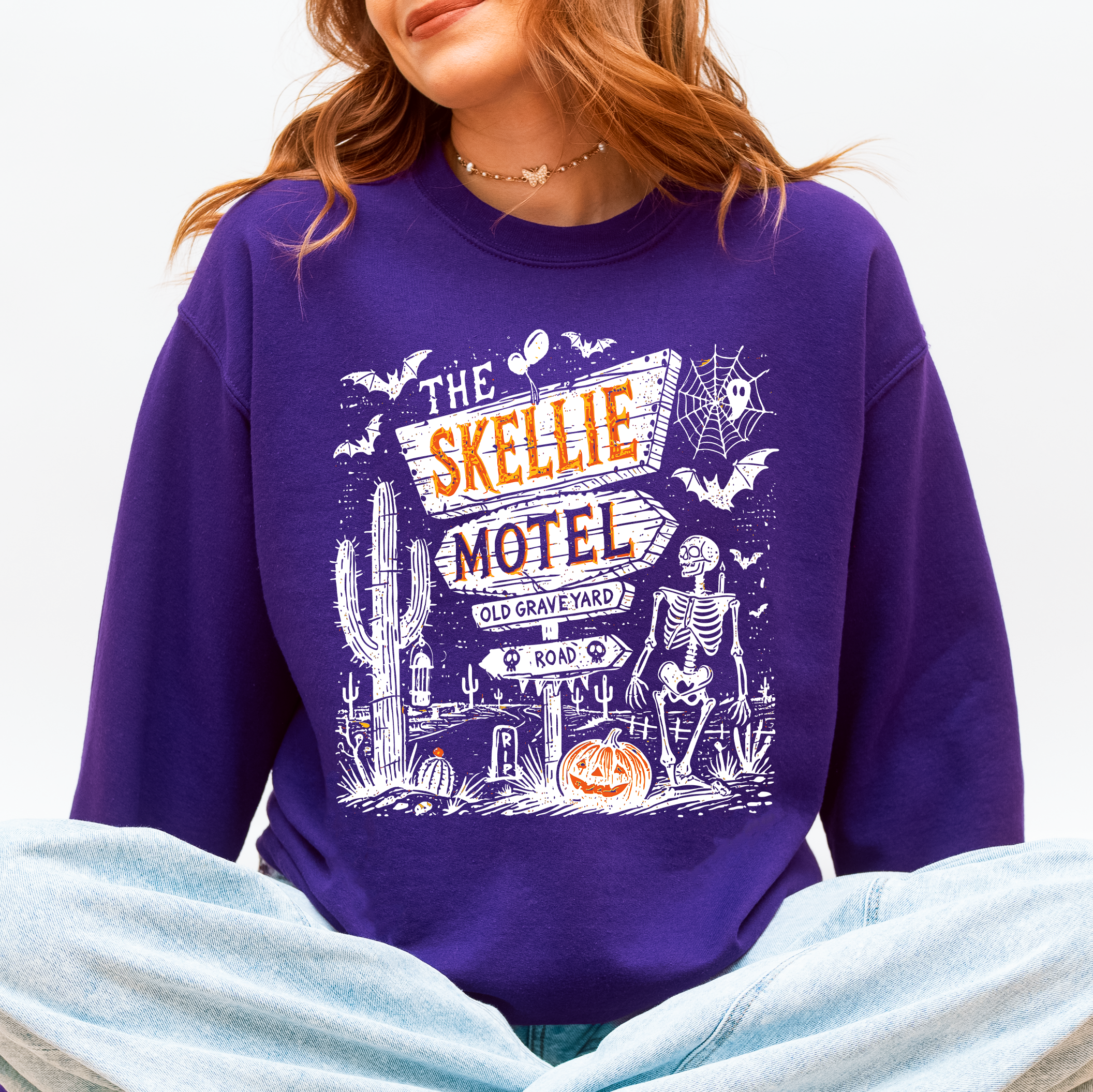 The Skellie Motel Skeleton Halloween Night Haunting Edition With Spooky Vibes And Retro Motel Aesthetic Sweatshirt