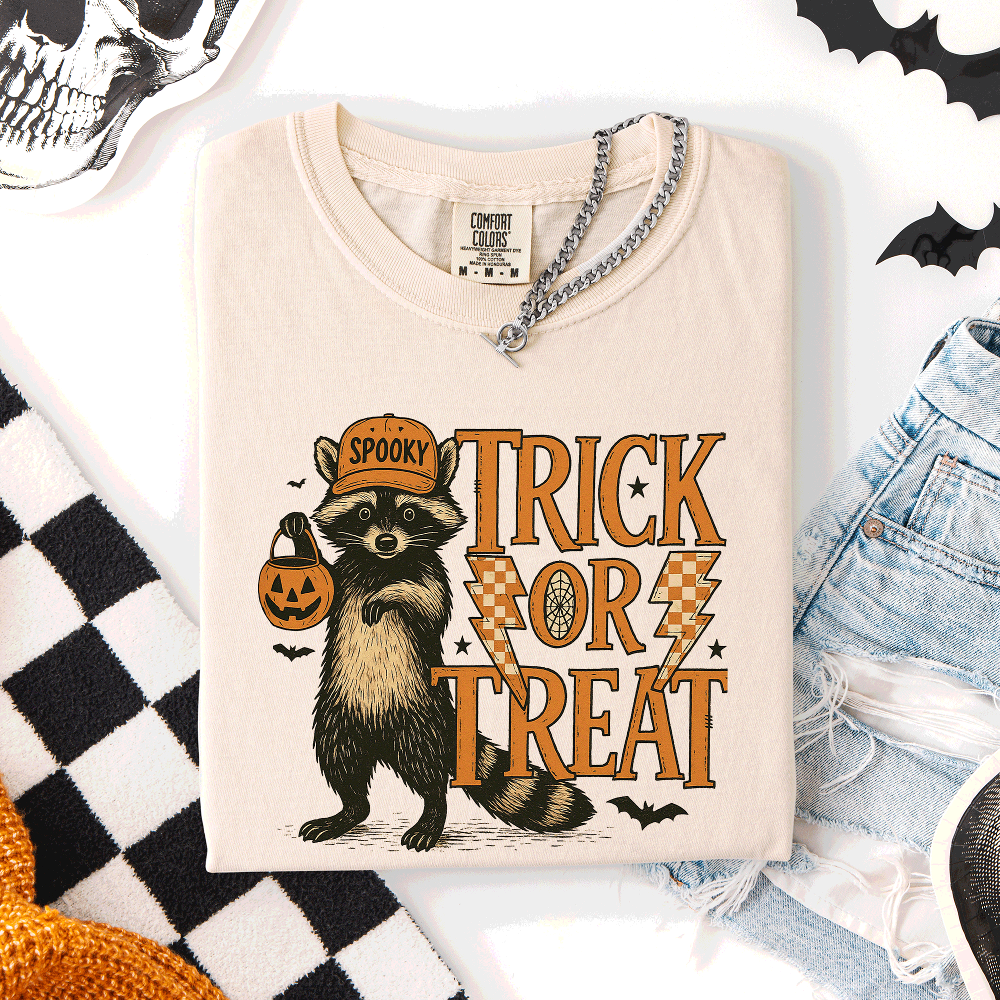 Trick or Treat Raccoon Halloween Mischief With Skeletons Ghosts Cats And Pumpkins Comfort Colors Tee
