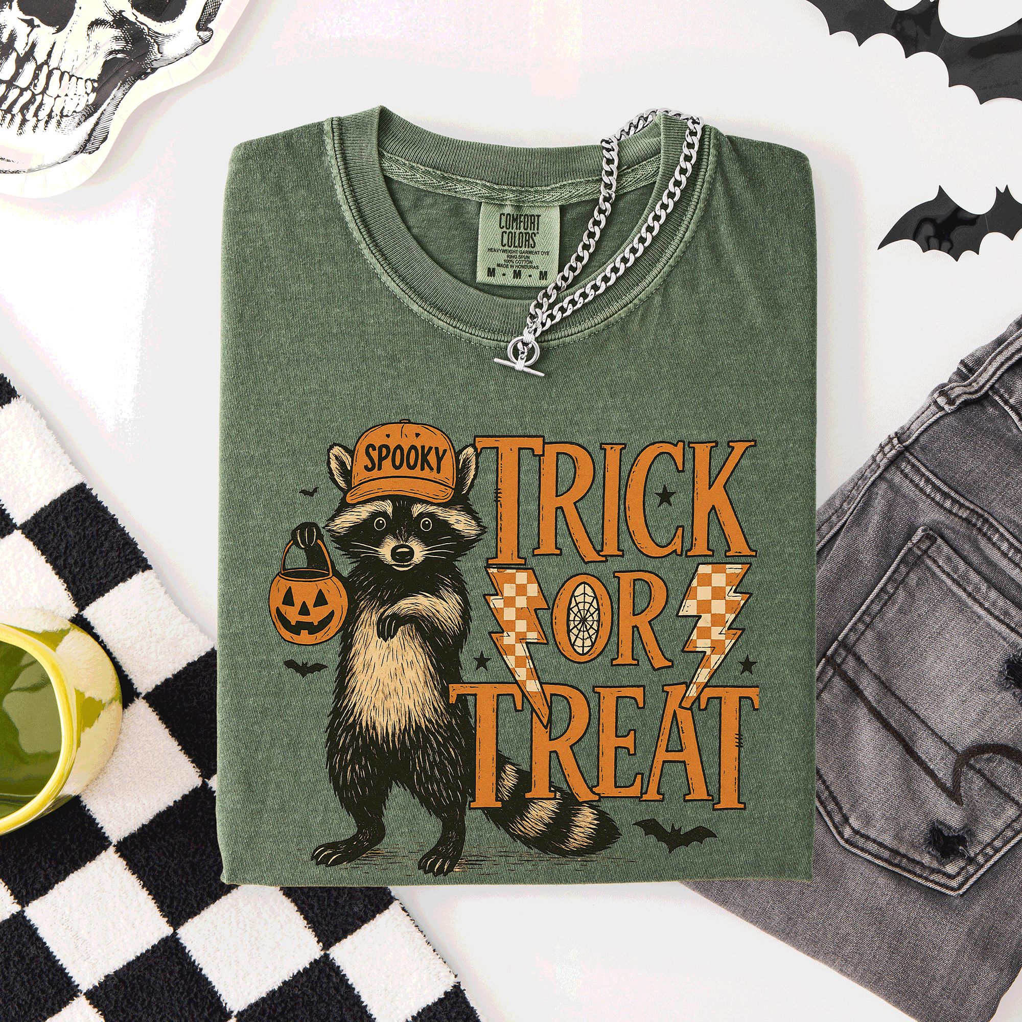 Trick or Treat Raccoon Halloween Mischief With Skeletons Ghosts Cats And Pumpkins Comfort Colors Tee